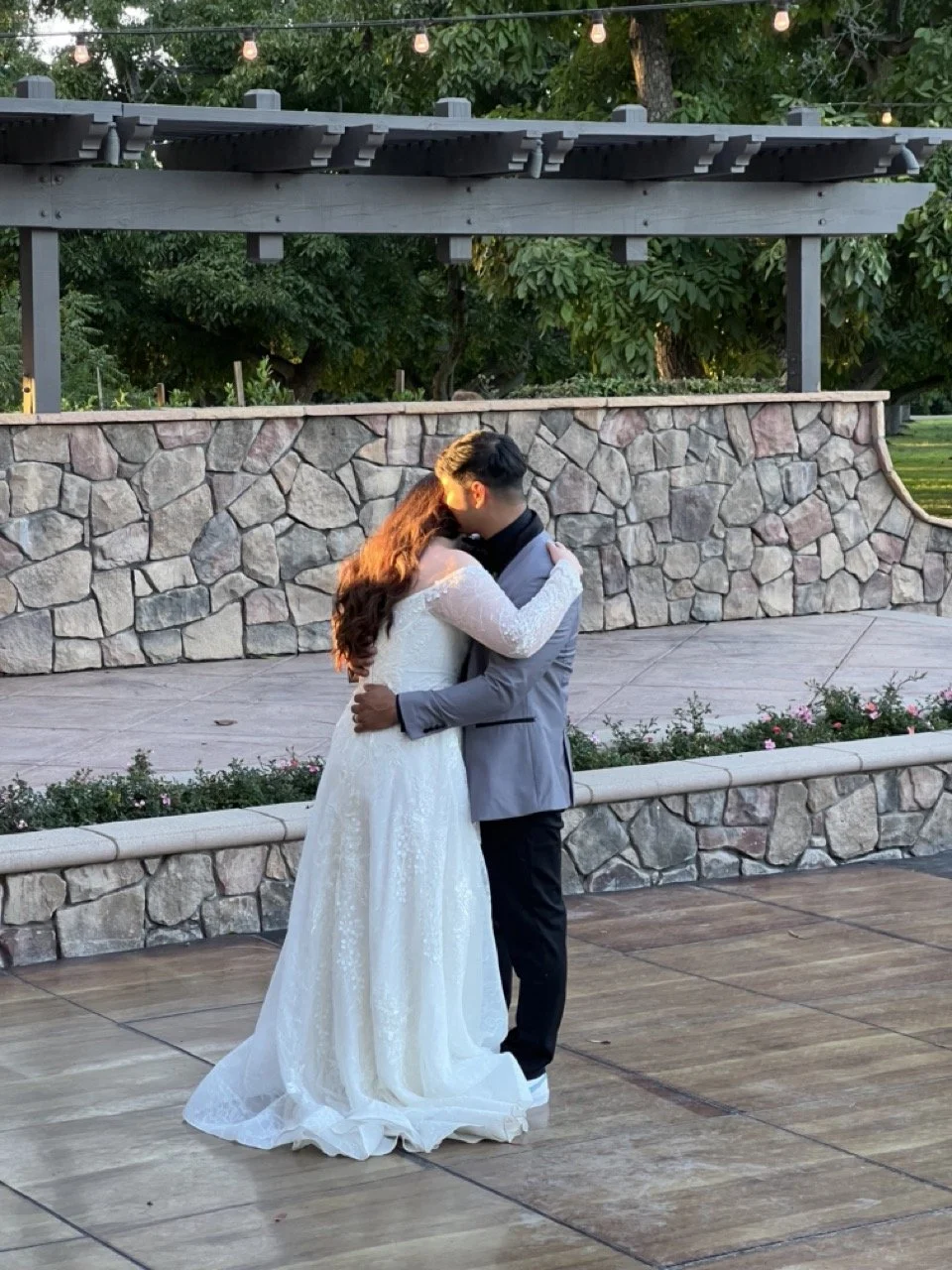 Bride and groom's first dance at sundown